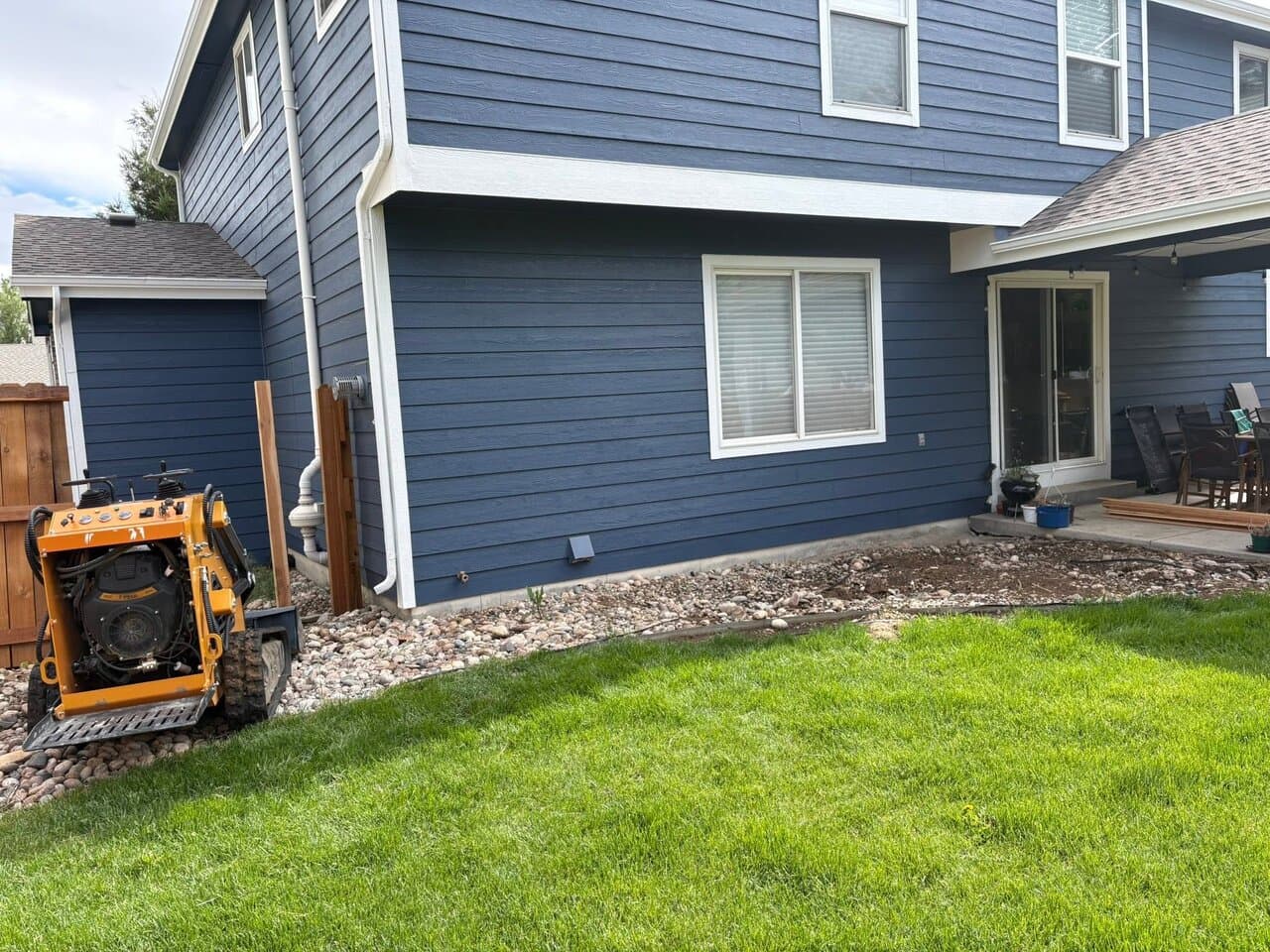 Finished residential outdoor space with landscaping