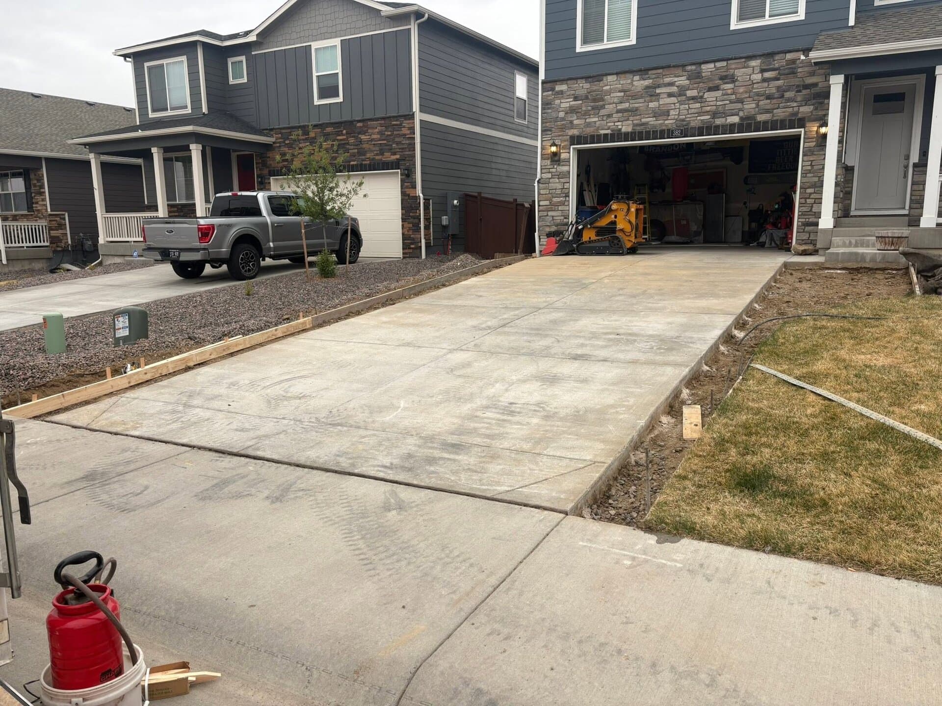 Freshly poured concrete driveway by A&I Concrete